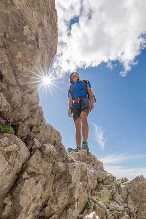 Europe, Italy, Veneto, Agordino, mountain climber on the via ferrata Stella Alpina at mount Agner, Pale di San Martino, Dolomites Stock Photo - Rights-Managed, Code: 879-09190575