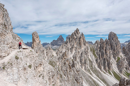 Misurina, Cadini mountains, Dolomites, province of Belluno, Veneto, Italy. A mountaineer on the mountain trail "Durissini" Stock Photo - Rights-Managed, Code: 879-09190753
