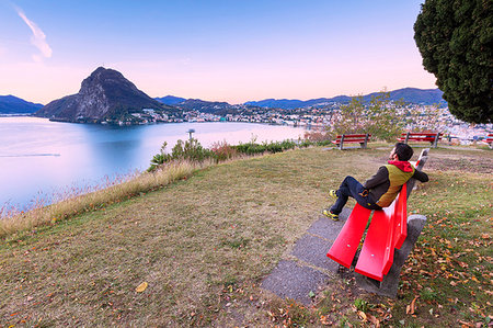 simsearch:841-06344529,k - Man on bench on the shore of Lake Lugano, Parco San Michele, Lugano, canton of Ticino, Switzerland Foto de stock - Con derechos protegidos, Código: 879-09191313