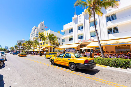 Yellow taxi cab, Ocean Drive, Miami Beach, Florida, USA, North America Stockbilder - Lizenzpflichtiges, Bildnummer: 879-09191332