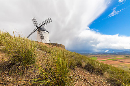 Windmill on hill, Consuegra, Don Quixote route, Toledo province, Castile-La Mancha region, Spain Stockbilder - Lizenzpflichtiges, Bildnummer: 879-09191395