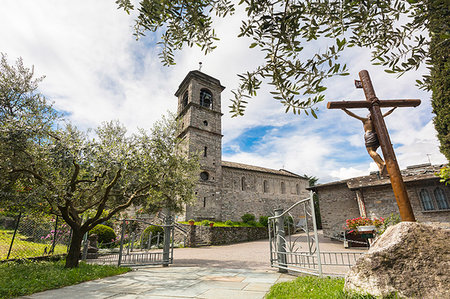 Bell tower and crucifix, Piona Abbey (Abbazia Priorato di Piona), Colico, Lecco province, Lombardy, Italy Stock Photo - Rights-Managed, Code: 879-09191465