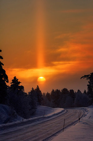 simsearch:879-09191291,k - Sun pillar optical effect photographed near Muonio, Lapland, Finalnd, Europe Stock Photo - Rights-Managed, Code: 879-09191516