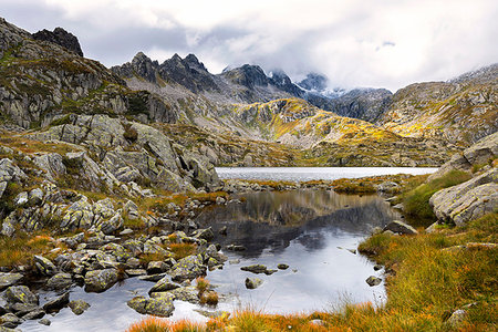 simsearch:879-09021341,k - Nero lake in summer season at daylight Europe, Italy, Trentino, Nambrone valley, Madonna di Campiglio Fotografie stock - Rights-Managed, Codice: 879-09191631