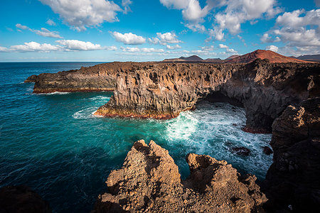 Cliffs in Los Hervideros, Timanfaya National Park, Lanzarote, Canary Island, Spain,Europe Photographie de stock - Rights-Managed, Code: 879-09191793