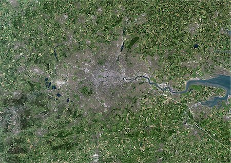 satellite view city - London, Uk, True Colour Satellite Image. London, England, UK. True colour satellite image of London, the capital city of UK. Image taken on 19 June 2000 using LANDSAT 7 data. Stock Photo - Rights-Managed, Code: 872-06052904