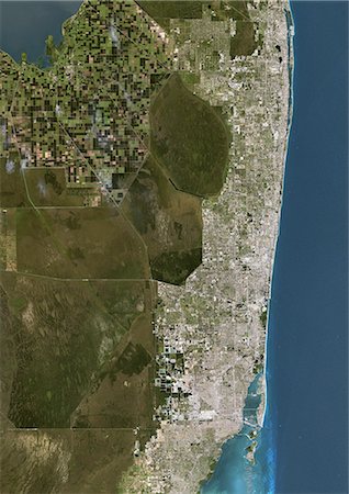 florida city beaches - Miami, Florida, Usa, True Colour Satellite Image. Miami, Florida, USA. True colour satellite image of the city of Miami, taken on 9 January 2002, using LANDSAT 7 data. Stock Photo - Rights-Managed, Code: 872-06052915