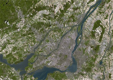 Montreal, Canada, True Colour Satellite Image. Montreal, Canada. True colour satellite image of the city of Montreal, taken on 8 June 2001, using LANDSAT 7 data. Foto de stock - Con derechos protegidos, Código: 872-06052917