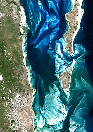 Bazaruto Archipelago, Mozambique, True Colour Satellite Image. True colour satellite image of sand islands of Bazaruto Archipelago off the Mozambique coast. Image taken on 21 April 1989 using LANDSAT data. Stock Photo - Rights-Managed, Code: 872-06052960
