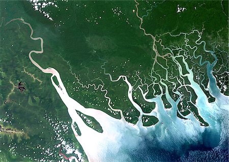 delta de río - Satellite View of Hawooi And Kikori Deltas, Papua New Guinea Foto de stock - Con derechos protegidos, Código: 872-06052983