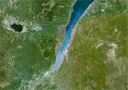 fleuve saint-laurent - Fleuve Saint-Laurent, Québec, Canada, véritable couleur Satellite Image. Image satellite de la ville de Québec et l'embouchure du fleuve Saint-Laurent, reliant l'océan Atlantique et les grands lacs. Image prise le 23 août 2002, à l'aide de données LANDSAT. Photographie de stock - Rights-Managed, Code: 872-06052995