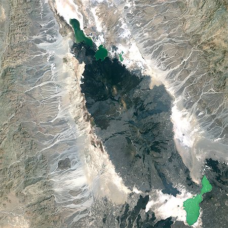 simsearch:872-06053084,k - Volcan Erta Ale, en Éthiopie, True Image Satellite en couleurs. Image satellite de l'Erta Ale volcano, Éthiopie, couleur vraie. L'Erta Ale (613 m) est un volcan bouclier situé dans la région des Afars d'Afrique de l'est. Image prise le 5 février 2002 à l'aide de données LANDSAT. Impression format 30 x 30 cm. Photographie de stock - Rights-Managed, Code: 872-06053064