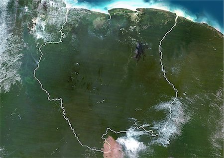 suriname - Suriname, en Amérique du Sud, véritable couleur Image Satellite avec bordure. Vue satellite du Suriname (avec bordure). Cette image a été compilée à partir de données acquises par les satellites LANDSAT 5 & 7. Photographie de stock - Rights-Managed, Code: 872-06053181