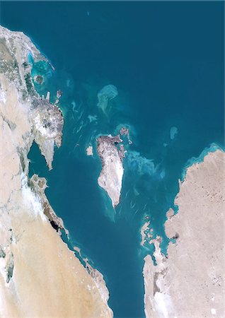 Bahrain, Middle East, Asia, True Colour Satellite Image. Satellite view of Bahrain . This image was compiled from data acquired by LANDSAT 5 & 7 satellites. Stock Photo - Rights-Managed, Code: 872-06053253