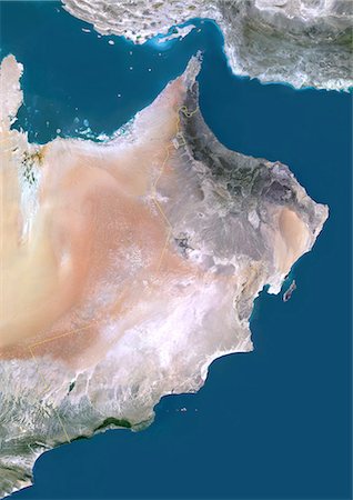 Oman, Moyen-Orient, Asie, True Image Satellite couleur avec bordure. Vue satellite de l'Oman (avec bordure). Cette image a été compilée à partir de données acquises par les satellites LANDSAT 5 & 7. Photographie de stock - Rights-Managed, Code: 872-06053304