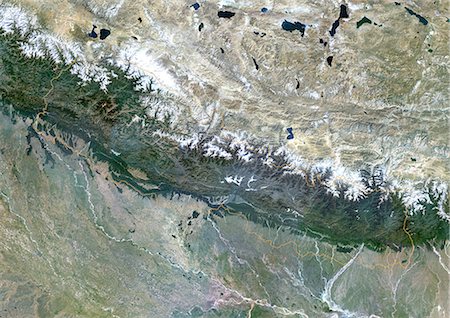 Nepal, Asia, True Colour Satellite Image With Border. Satellite view of Nepal (with border). This image was compiled from data acquired by LANDSAT 5 & 7 satellites. Stock Photo - Rights-Managed, Code: 872-06053302