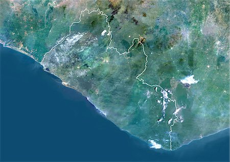 Libéria, Afrique, vraie couleur Image Satellite avec bordure. Vue satellite du Libéria (avec bordure). Cette image a été compilée à partir de données acquises par les satellites LANDSAT 5 & 7. Photographie de stock - Rights-Managed, Code: 872-06053346