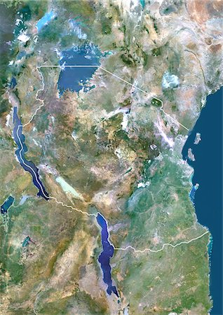 Tanzanie, Afrique, vraie couleur Image Satellite avec bordure. Vue satellite de la Tanzanie (avec bordure). Cette image a été compilée à partir de données acquises par les satellites LANDSAT 5 & 7. Photographie de stock - Rights-Managed, Code: 872-06053386
