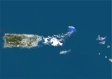 simsearch:872-06053420,k - Puerto Rico, Virgin Islands, Anguilla, St Barth & St Martin, Caribbean, True Colour Satellite Image. Satellite view of Puerto Rico, Virgin Islands, Anguilla, St Barth & St Martin in the Caribbean. This image was compiled from data acquired by LANDSAT 5 & 7 satellites. Foto de stock - Con derechos protegidos, Código: 872-06053414