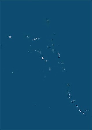 simsearch:872-06053320,k - Marshall Islands And Kiribati, Micronesia, Oceania, True Colour Satellite Image. Satellite view of the Marshall Islands and Kiribati, located in the Pacific ocean. This image was compiled from data acquired by LANDSAT 5 & 7 satellites. Foto de stock - Con derechos protegidos, Código: 872-06053423