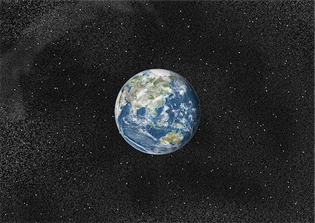 satellite view - Globe Centred On Asia And Oceania, True Colour Satellite Image. True colour satellite image of the Earth centred on Asia and Oceania with cloud coverage. This image in orthographic projection was compiled from data acquired by LANDSAT 5 & 7 satellites. Stock Photo - Rights-Managed, Code: 872-06053643
