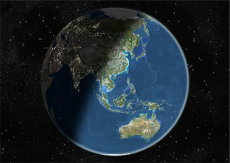 planète - Monde centré sur l'Asie et l'Océanie, True Image Satellite en couleurs. Image satellite de véritable couleur de la terre centrée sur l'Asie et l'Océanie, durant le solstice d'hiver, à 12 heures GMT. Cette image dans une projection orthographique a été compilée à partir de données acquises par les satellites LANDSAT 5 & 7. Photographie de stock - Rights-Managed, Code: 872-06053682
