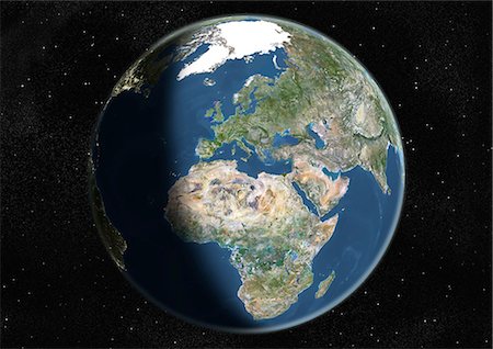 Monde centré sur l'Europe et l'Afrique, True Image Satellite en couleurs. Image satellite de véritable couleur de la terre centrée sur l'Europe et l'Afrique, pendant le solstice d'été à 6 heures GMT. Cette image dans une projection orthographique a été compilée à partir de données acquises par les satellites LANDSAT 5 & 7. Photographie de stock - Rights-Managed, Code: 872-06053692