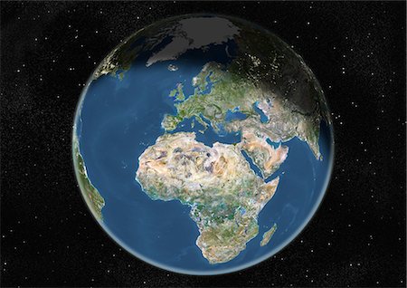 Monde centré sur l'Europe et l'Afrique, True Image Satellite en couleurs. Image satellite de véritable couleur de la terre centrée sur l'Europe et l'Afrique, pendant le solstice d'hiver, à 12 heures GMT. Cette image dans une projection orthographique a été compilée à partir de données acquises par les satellites LANDSAT 5 & 7. Photographie de stock - Rights-Managed, Code: 872-06053702