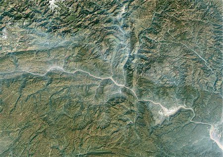 Three Gorges Region, China, In 1987, True Colour Satellite Image. True colour satellite image of the Three Gorges region along the Yangtze River, China. Image taken in 1987, using LANDSAT data. Stock Photo - Rights-Managed, Code: 872-06053800