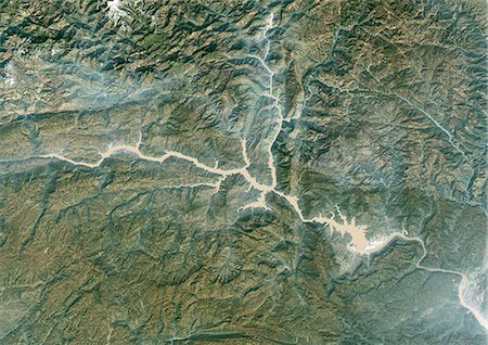 Three Gorges Region, China, In 2000, True Colour Satellite Image. True colour satellite image of the Three Gorges region along the Yangtze River, China. Image taken in 2000, using LANDSAT data. Stock Photo - Rights-Managed, Code: 872-06053801