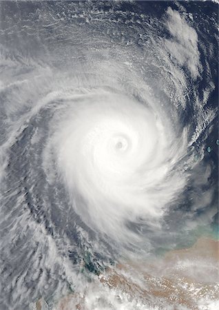 Cyclone Billy (Australie), en 2008, True Image Satellite de la couleur. Tropical Cyclone Billy au-dessus de l'océan Indien, au large de la côte d'Australie-occidentale, le 25 décembre 2008. Image satellite de vrais couleurs à partir de données MODIS. Photographie de stock - Rights-Managed, Code: 872-06053820