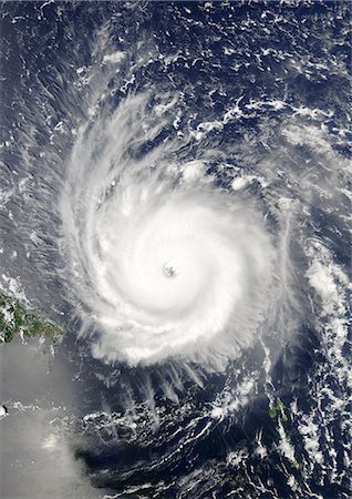 Hurricane Frances, Atlantic Ocean, On 31/08/2004, True Colour Satellite Image. Hurricane Frances on 31 August 2004 north of San Juan, Puerto Rico. True-colour satellite image using MODIS data. Foto de stock - Con derechos protegidos, Código: 872-06053836