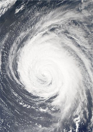 severe - Hurricane Ioke, Pacific Ocean, On 04/09/2006, True Colour Satellite Image. Hurricane Ioke on 4 September 2006 in the northwest Pacific ocean. True-colour satellite image using MODIS data. Stock Photo - Rights-Managed, Code: 872-06053844