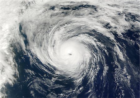 severe - Hurricane Humberto, Atlantic Ocean, In 2001, True Colour Satellite Image. Hurricane Humberto on 26 September 2001 over the Atlantic ocean, after passing near the Bermuda islands. True-colour satellite image using MODIS data. Stock Photo - Rights-Managed, Code: 872-06053842