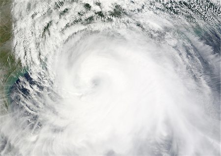 satellite view storm - Hurricane Ike, Gulf Of Mexico, In 2008, True Colour Satellite Image. Hurricane Ike on 12 September 2008 over the Gulf of Mexico nearing the Texas and Louisiana coast, US. True-colour satellite image using MODIS data. Stock Photo - Rights-Managed, Code: 872-06053843