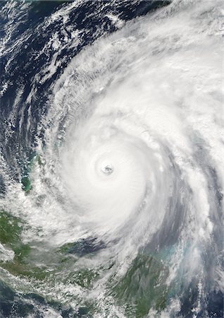 simsearch:872-06053847,k - Hurricane Wilma, Atlantic Ocean, On 21/10/2005, True Colour Satellite Image. Hurricane Wilma on 21 October 2005 nearing the Yucatan Peninsula coast, Mexico.True-colour satellite image using MODIS data. Stock Photo - Rights-Managed, Code: 872-06053860