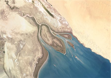 Colorado River Delta (Mexique), véritable couleur Image Satellite. Image satellite de véritable couleur de la Colorado River Delta, au Mexique. La rivière Colorado se jette dans le golfe de Californie. Isla Montague est la grande île située dans le centre de l'image. Image composite en utilisant les données de LANDSAT 7. Photographie de stock - Rights-Managed, Code: 872-06053911