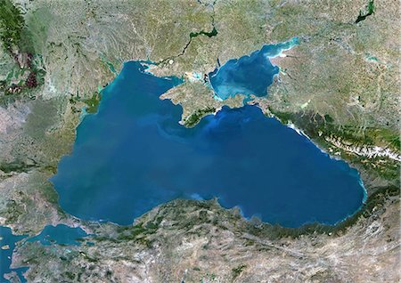 simsearch:872-06054843,k - Black Sea, Europe, True Colour Satellite Image. True colour satellite image of the Black Sea, an inland sea bounded by Europe, Anatolia and the Caucasus. It lies between Bulgaria, Georgia, Romania, Russia, Turkey and Ukraine. The Black Sea connects to the Sea of Azov (at top). The Bosphorus strait connects it to the Sea of Marmara (down left). Composite image using LANDSAT 5 data. Foto de stock - Con derechos protegidos, Código: 872-06053948