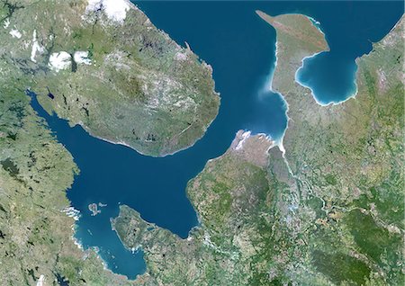 Russie, mer Blanche, couleur vraie Image-Satellite. Vrai couleur image satellite de la mer Blanche, un bras de la mer de Barents (en haut) sur la côte nord-ouest de la Russie. Image composite à l'aide de données LANDSAT 5. Photographie de stock - Rights-Managed, Code: 872-06053942