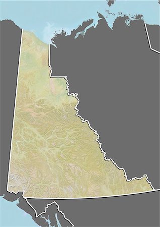 satellite images of rocky mountains canada - Relief map of the Yukon, Canada. This image was compiled from data acquired by LANDSAT 5 & 7 satellites combined with elevation data. Stock Photo - Rights-Managed, Code: 872-06160537