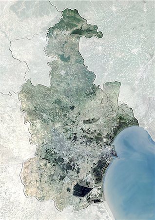 Satellite view of Tianjin, China. This image was compiled from data acquired by LANDSAT 7 satellite. Stock Photo - Rights-Managed, Code: 872-06160595