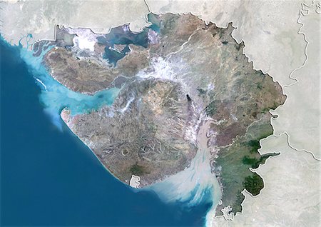 Vue satellite de l'état de Gujarat, en Inde. Cette image a été compilée à partir de données acquises par les satellites LANDSAT 5 & 7. Photographie de stock - Rights-Managed, Code: 872-06160725