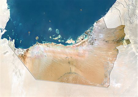 Vue satellite de l'émirat d'Abu Dhabi, Émirats Arabes Unis. Cette image a été compilée à partir de données acquises par les satellites LANDSAT 5 & 7. Photographie de stock - Rights-Managed, Code: 872-06160930