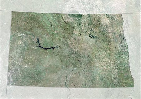 Vue satellite l'état du Dakota du Nord, aux États-Unis. Cette image a été compilée à partir de données acquises par les satellites LANDSAT 5 & 7. Photographie de stock - Rights-Managed, Code: 872-06161042