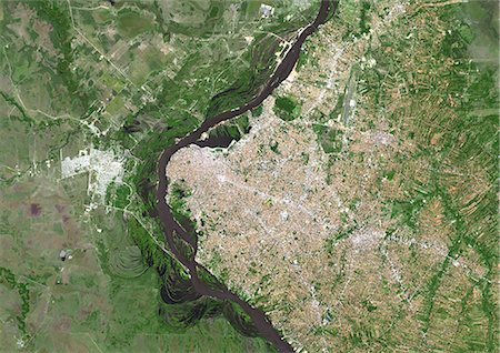 simsearch:872-08082711,k - Colour satellite image of Asuncion, Paraguay. Image taken on September 21, 2014 with Landsat 8 data. Foto de stock - Con derechos protegidos, Código: 872-08082751