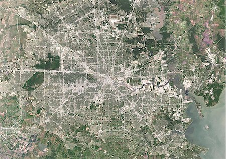 simsearch:872-08082731,k - Colour satellite image of Houston, Texas, USA. Image taken on May 16, 2014 with Landsat 8 data. Foto de stock - Con derechos protegidos, Código: 872-08082769