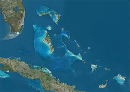 simsearch:872-08689423,k - Satellite view of The Bahamas. It consists of more than 700 islands, cays and islets in the Atlantic Ocean, north of Cuba and southeast of the US state of Florida. The capital is Nassau on the island of New Providence. This image was compiled from data acquired by Landsat satellites. Foto de stock - Con derechos protegidos, Código: 872-08689412