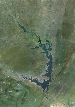 simsearch:872-06054901,k - Satellite view of Lake Volta, in Ghana. It is the largest reservoir by surface area in the world, and the fourth largest by volume. This image was compiled from data acquired by Landsat satellites. Photographie de stock - Rights-Managed, Code: 872-08689450