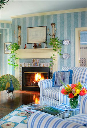 fireplace autumn - Open fireplace and striped armchairs in blue sitting room, Provence Style, L'Auberge Provencale Inn, Virginia, USA. Stock Photo - Rights-Managed, Code: 872-08914856