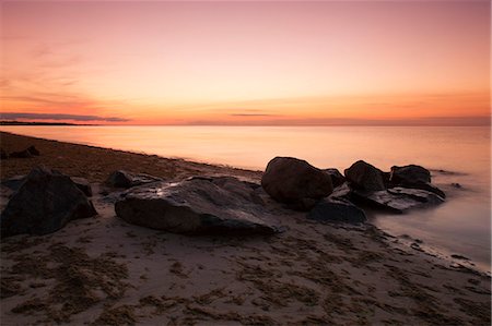 Sunset on the bay in Cape Cod, Brewster, MA. Foto de stock - Con derechos protegidos, Código: 872-08914979